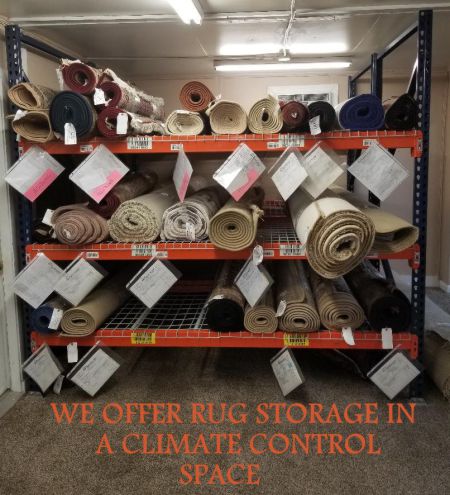 A room filled with lots of rugs on shelves.